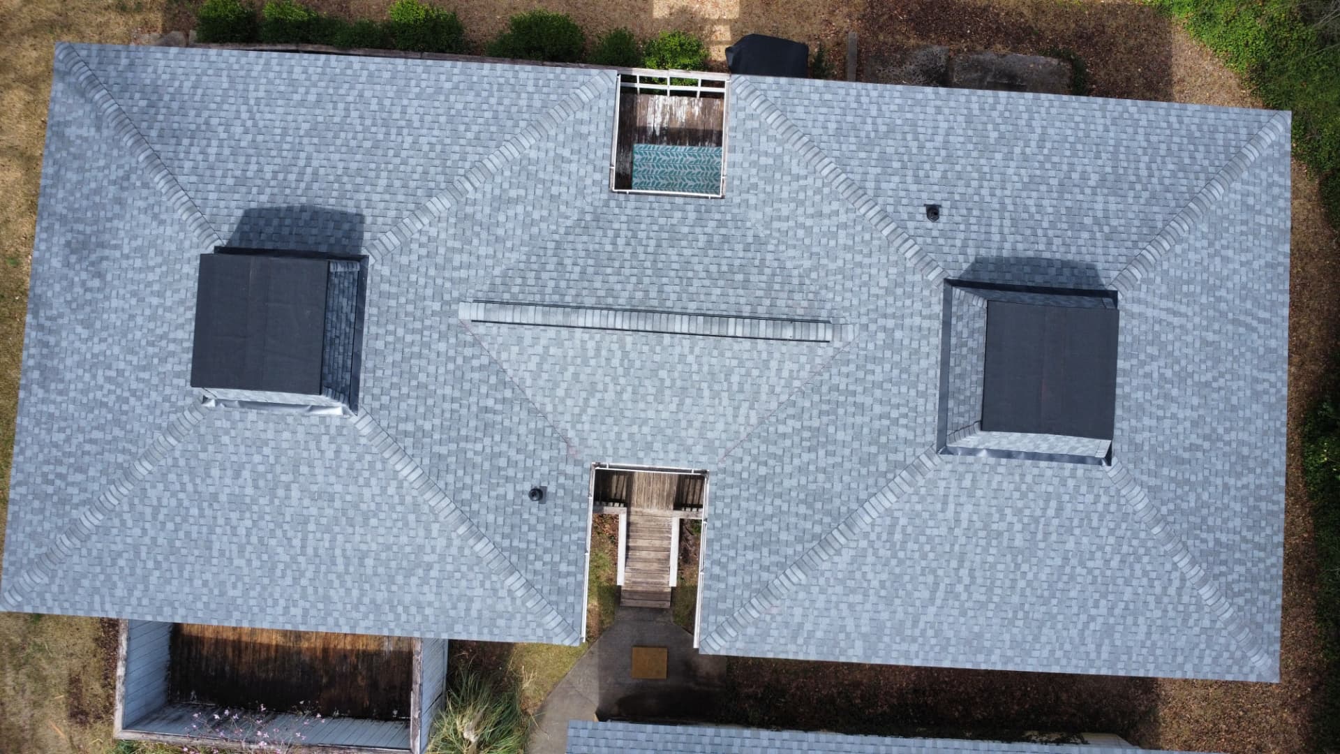 Aerial view of a completed CertainTeed Landmark architectural shingle roof replacement in Greenwood, South Carolina